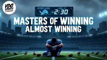A football player sits alone and dejected at midfield, surrounded by scattered footballs. The scoreboard reads “Detroit Lions 2:30 Lomel St.” Overhead, bold text says “MASTERS OF WINNING ALMOST WINNING.” The stadium and city skyline are visible in the background.