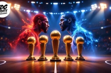 Two opposing player profiles, reminiscent of the best NBA player clashes, face off with fiery and icy effects against a blurred stadium background. Five golden trophies gleam on a wooden surface between them, while the VDG Sports logo graces the top left corner.