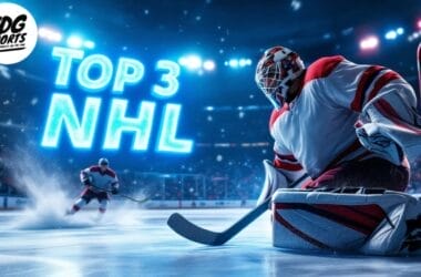 A hockey goalie in red and white gear stands ready on the ice, as another player charges toward the goal. A blue neon sign reading "Top 3 NHL" glows in the background, making this illuminated rink a must-watch for fanatics.