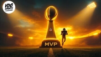 A football MVP trophy, inspired by the NFL MVP award, stands glowing on a field at sunset. A player in full gear runs nearby as stadium lights shine in the background. The VDG Sports logo appears in the top left corner.