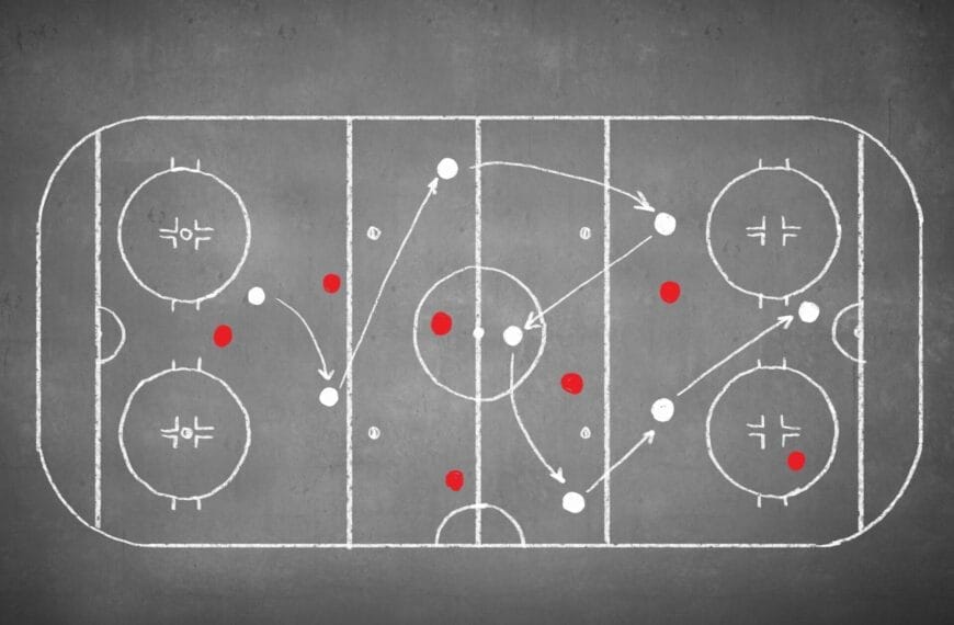 Chalkboard drawing of a hockey rink, showcasing the evolution of hockey strategies with red and white dots and arrows illustrating dynamic player movements.