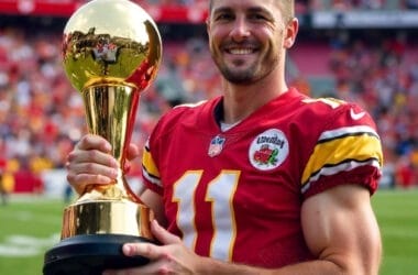 A smiling athlete in a red jersey, clutching a gold trophy, stands proudly on the football field, epitomizing the spirit of the Best NFL Players of All Time.