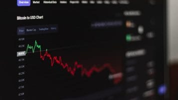 A Bitcoin to USD chart showing a downward trend, with red lines indicating the decline, resembles how a team’s basketball stats might dip during a losing streak.