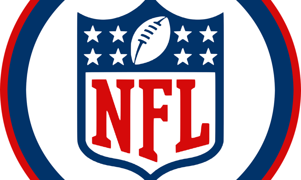 NFL logo with a football and stars on a shield, surrounded by red and blue circular borders, honoring the legacy of the greatest NFL players of all time.