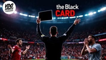 A referee stands with arms raised, holding the black card high in a stadium. Two soccer players react; one appears frustrated, and the other clasps his hands together. "The Black CARD" is prominently displayed in the upper right, with the VDG Sports logo in the upper left.