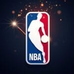 The NBA logo, showing a white silhouette of a basketball player dribbling, is centered on a blue and red background. To the left, a lit magic wand emits sparkles, adding a magical effect to the image. The background is dark.
