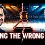 Two men in suits stand on either side of a judge's gavel split by a lightning bolt, with a hockey rink in the background. The text reads, "BOOING THE WRONG GUY?" The scene is dramatic and brightly lit, implying a debate or controversy.